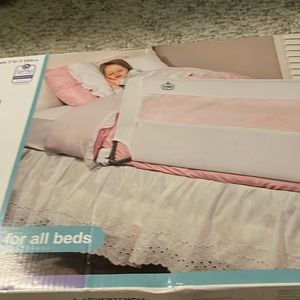 Swing down bed rail